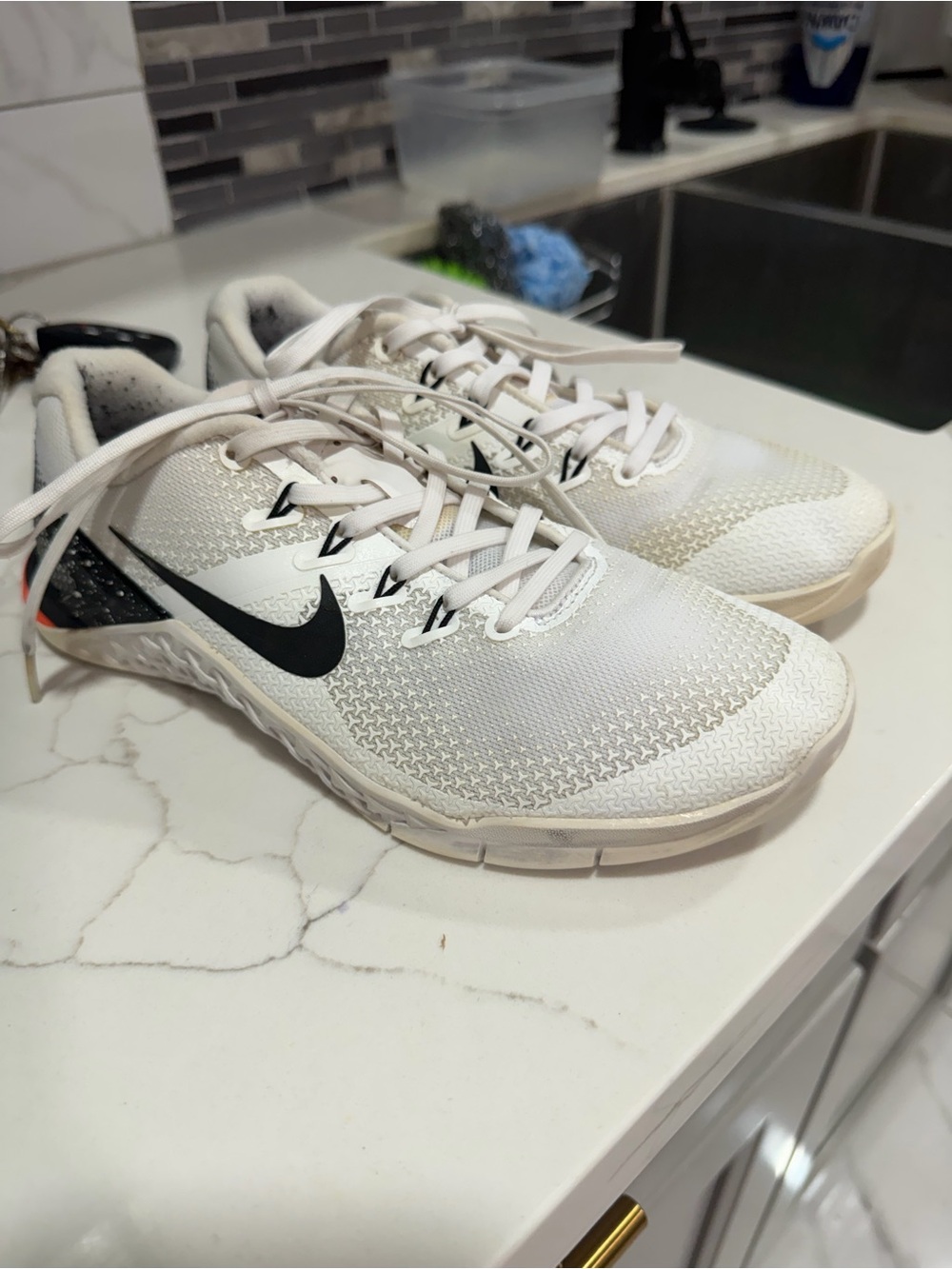 Nike women’s White Athletic Training Shoes with Black Swoosh